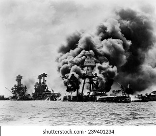 Pearl Harbor: three stricken U.S. battleships. Left to right: U.S.S. West Virginia, severely damaged; U.S.S. Tennessee, damaged; and U.S.S. Arizona, sunk, December 7, 1941