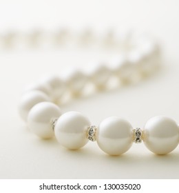 Pearl Necklace On White Background