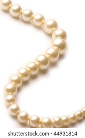 pearl necklace on white background