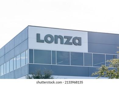 
Pearland, Texas, USA - February 14, 2022: Lonza’s Sign On The Building At Their Manufacturing Facility In Pearland, Texas. Lonza Group Is A Swiss Multinational Chemicals And Biotechnology Company. 