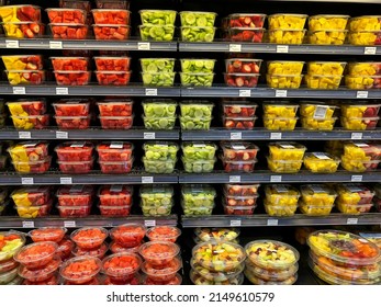 Pearland, TX, USA - March 10, 2022: Fresh Cut Fruit And Vegetables In The Boxes Or Bowls On The Shelves In A Supermarket. 