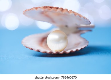 Pearls On Blue Background Stock Photo (Edit Now) 724880188