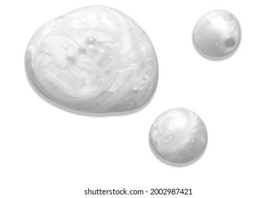 Pearly white thick creamy texture with bubbles. Soap or liquid cream with pearl colour on white background. Milky blobs. - Shutterstock ID 2002987421