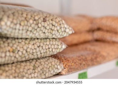 Peas. Transparent bags of peas on shelf. grain store. Agricultural sector in the farm. close-up. Isolated