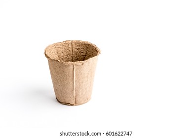 Peat pot for seedling it is isolated on a white background . - Powered by Shutterstock