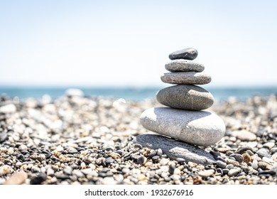 Pebble Cairn On The Beach