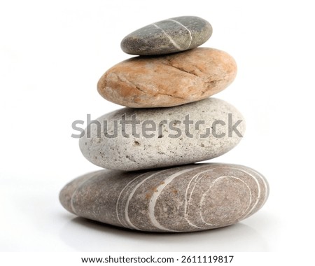 Pebble stack on white background