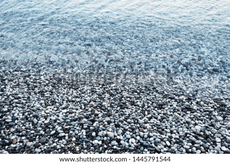 Similar – Lots of colorful stones on the beach