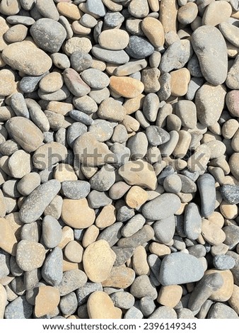 PebbleStones background nature by the beach. Color gravel rocky Stones beach sea shore pebbly natural background surface 