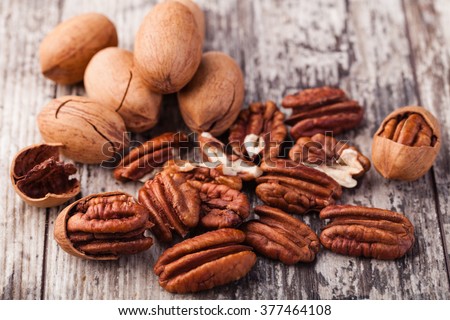 Pecan nuts on a wooden table 商業照片 © 