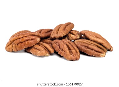 Pecan nuts pile on white background 