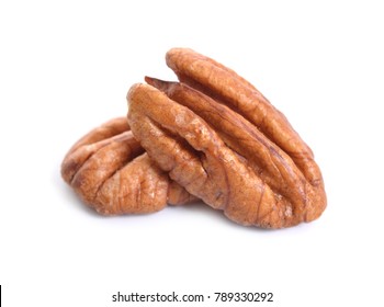 Pecan nuts pile on white background isolated.