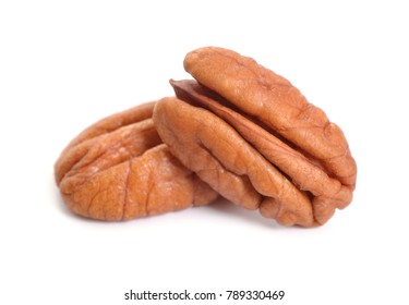 Pecan nuts pile on white background isolated.