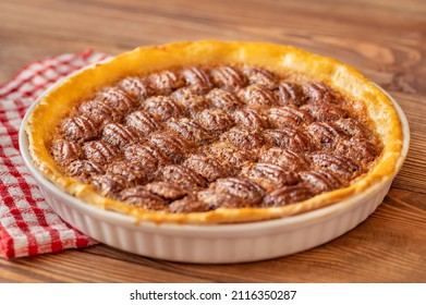 Pecan Pie - Traditional Southern US Dessert On Wooden Table