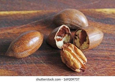 Pecans on a wooden board