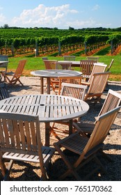Peconic, NY, USA July 29 Cafe tables are set up on a patio of a Vineyard in Peconic, New York, offering guests a romantic place for lunch or to relax