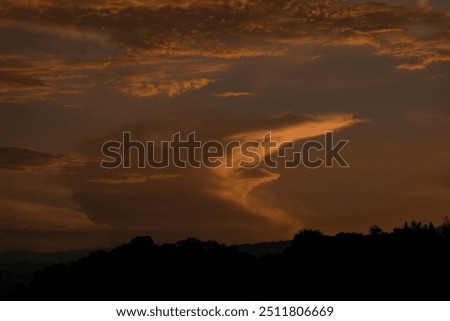 peculiar sunset cloud in the shape of a face