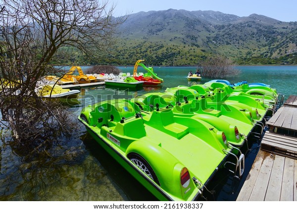 Pedal boats for rent moored at the\
lake of Kournas, Crete. Editorial taken 23 April\
2022