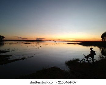Pedal Trail With Sunset On The Banks Of The Paraná River