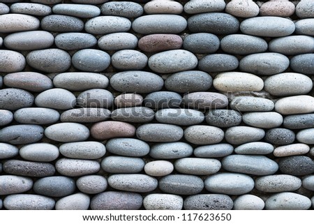 Peddle stone wall texture background