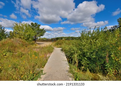 Pedestrian Bridge Over The Ravine On A Summer Day