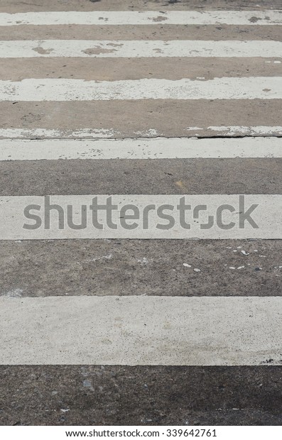 pedestrian\
crossing on the road, zebra traffic walk\
way