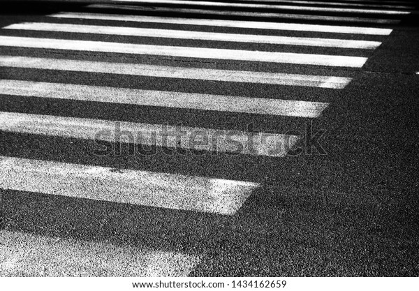 Pedestrian crossing of a road\
crossing