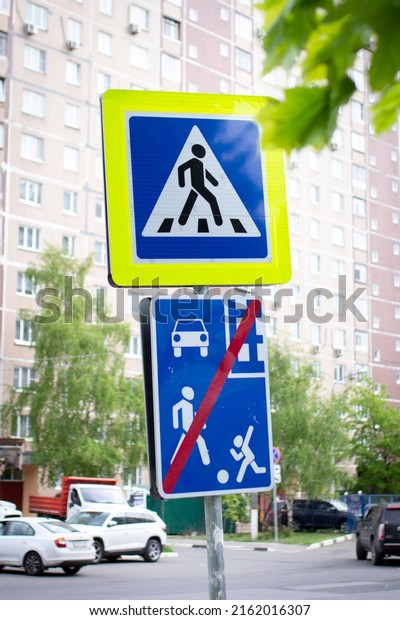 Pedestrian\
crossing sign and \