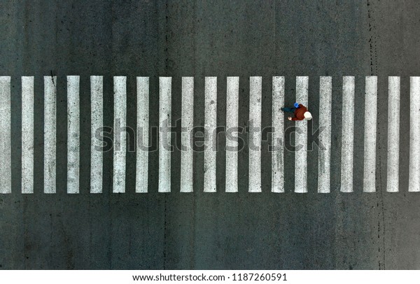 Pedestrian crosswalk\
aerial view from\
above
