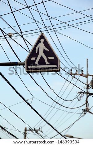 Pedestrian road sign between confusion of cables/Orientation Guide