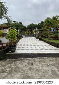 Pedestrian Side Walk In The Village Park With Nature Trees And Grass Around