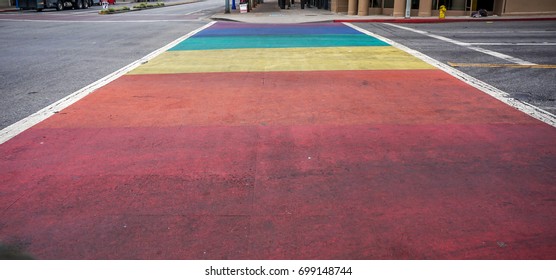 Pedestrian Street Crossing In Gay Rainbow Flag Colours In West Hollywood, Los Angeles, California, USA.