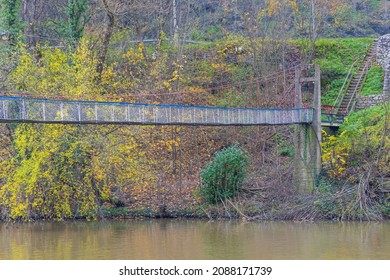 Pedestrian Suspension Bridge Over Small River in West Serbia Autumn