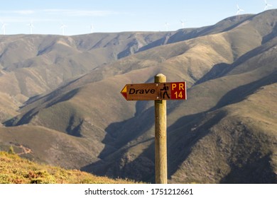 Pedestrian trail sign in the middle of a mountain range. Drave, magical village in Arouca, Portugal