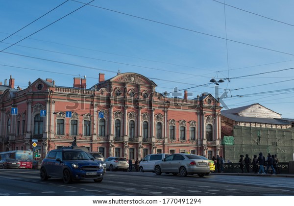 Pedestrians and cars on the Central street\
of Saint Petersburg. Russia, February\
2020