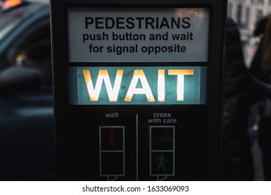 Pedestrians Cross Walk Button, Close Up To Wait Light Warning With Blurred Background 