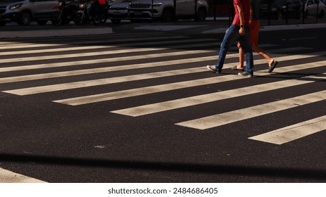 Pedestrians crossing a crosswalk in brazil - Powered by Shutterstock