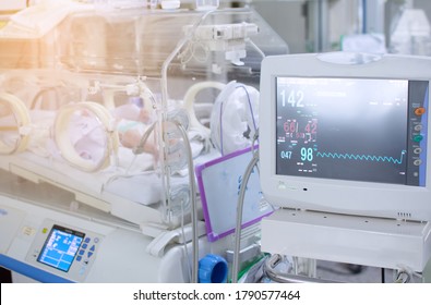Pediatric patients sleep in incubators in the ICU.
