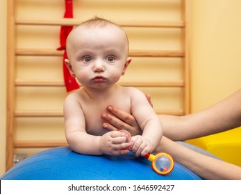 Pediatric Physical Therapy - An Infant Exercising On A Ball