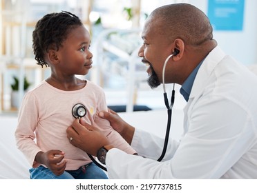 Pediatrician, consulting and stethoscope for lungs or chest checkup with doctor in medical healthcare hospital or clinic. Medicine, young patient and black man therapist listening to heart of baby - Powered by Shutterstock