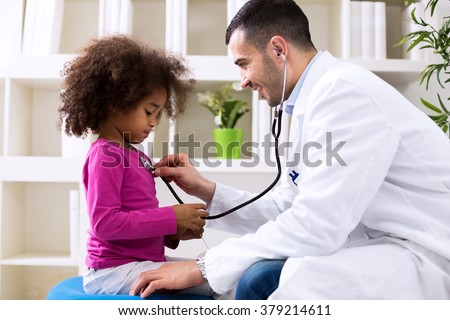 Pediatrician and little african girl at hospital