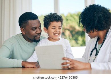 Pediatrician tablet, dad and child with a smile from patient results with good news at a hospital. Happy kid, father and doctor in a clinic consultation office with a healthcare worker and family - Powered by Shutterstock