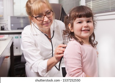 Pediatrician is visiting a child