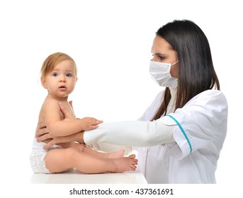 Pediatrician Woman Doctor In Medical Mask Holding In His Arms Child Baby Patient Physical Therapy Closeup Composition Isolated On A White Background