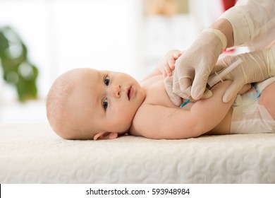 Pediatrics Doctor Giving Baby Child Vaccine Injection