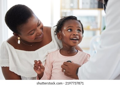 Pediatrics Doctor With Stethoscope, Mother And Child In Consultation Office. Happy Mom And Toddler Kid In Clinic Exam Checkup Or Appointment With Healthcare Worker Listening For Heart And Baby Health