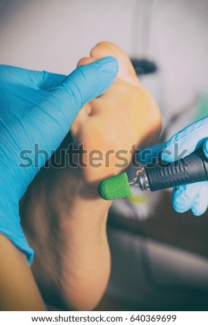 Pedicure closeup. cuticle removal