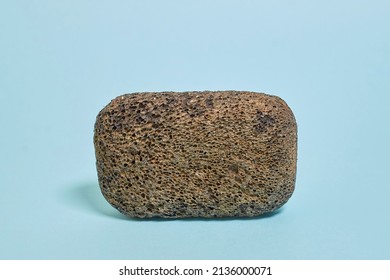 Pedicure Kit. Black Pumice Stone On A Blue Background