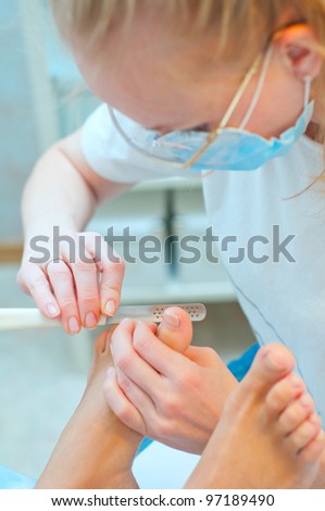Pedicure in process.Shallow depth of field