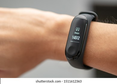 Pedometer With High Accumulated Steps Number On Man Wrist